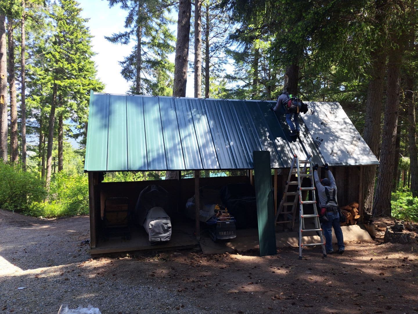 Peak Construction team meeting homeowners at a high-elevation home