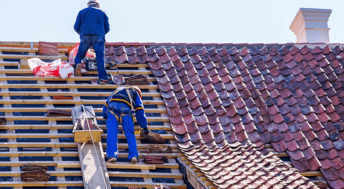 Peak Construction team meeting homeowners at a mountain home